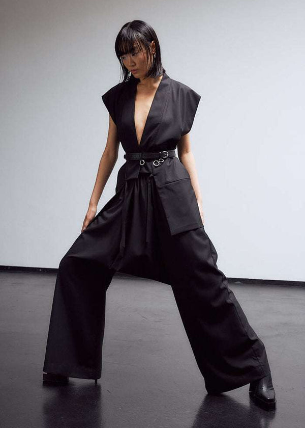 INTERNATIONAL CITIZEN.  Style: The Lanna Pant have a dropped crotch with excessive volume eased into an elastic waistband, drawcord and inseam pockets. Unisex Item. Made of Italian Wool, certified (RWS) Responsible Wool Standard, Obsidian Black. Spiritually Infused, Sustainable Luxury Fashion in Berlin.