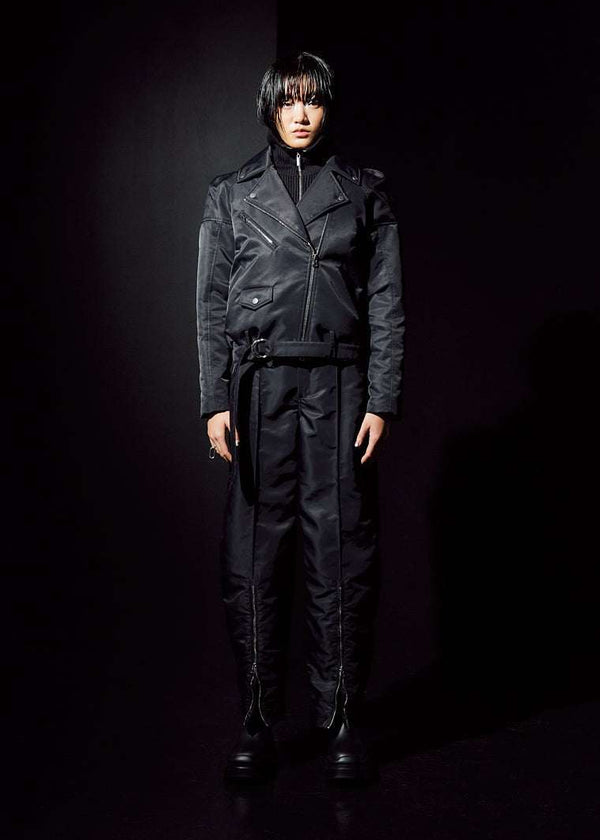 INTERNATIONAL CITIZEN.  Style: The M23 Moto Jacket has classic moto detailing and an innovative drape at the back shoulder creating a soft strength in the silhouette. Unisex Item. Full front photo. Made of Italian post-consumer recycled Nylon, Obsidian Black. Spiritually Infused, Sustainable Luxury Fashion in Berlin.