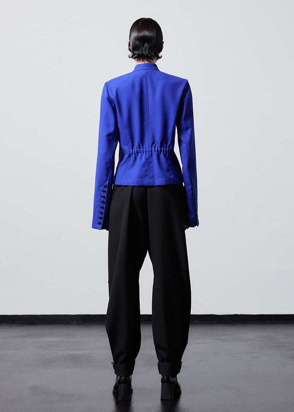 INTERNATIONAL CITIZEN.  Style: The Lunar Shacket. It has an elastic back waist. Full back photo. Made of Italian Wool RWS, Lapis Lazuli Blue. Spiritually Infused, Sustainable Luxury Fashion in Berlin.