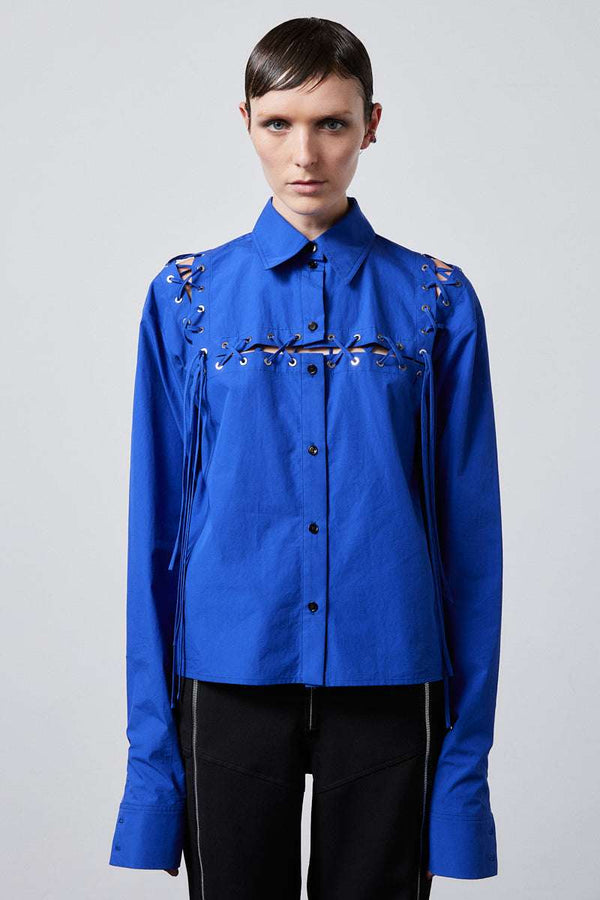INTERNATIONAL CITIZEN.  Style: The Stitch Shirt transforms into multiple iterations. Made of Italian Organic Cotton, Lapis Lazuli Blue. Spiritually Infused, Sustainable Luxury Fashion in Berlin. Front photo.