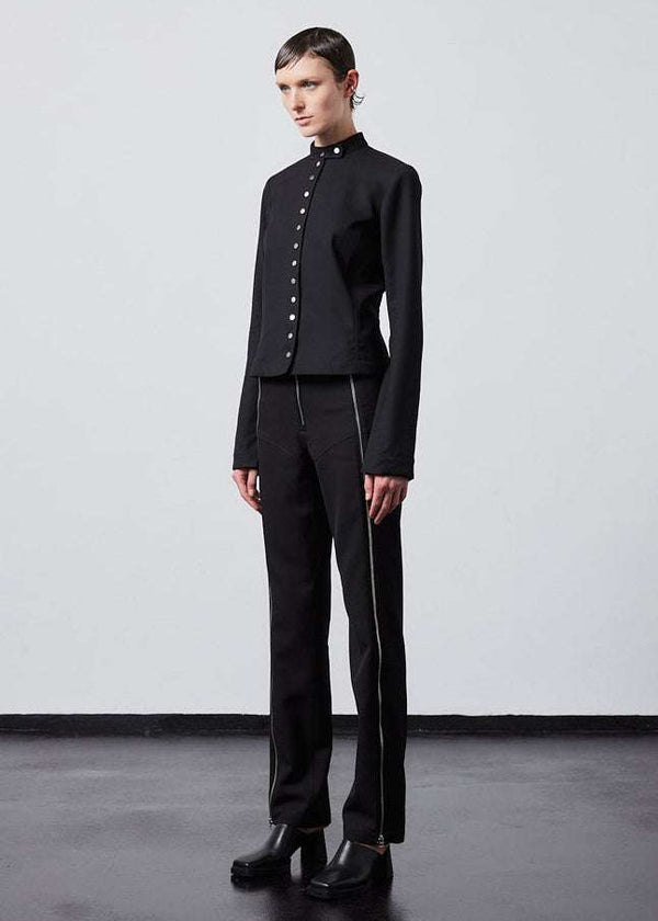 INTERNATIONAL CITIZEN.  Style: The Lunar Shacket is a slim jacket that wears like a shirt. Full front photo. Made of Italian Wool RWS, Obsidian Black. Spiritually Infused, Sustainable Luxury Fashion in Berlin.
