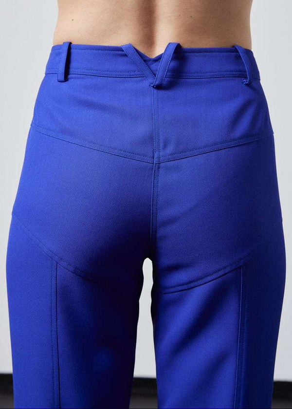 INTERNATIONAL CITIZEN.  Style: The Racer Pants. Made of Italian Wool RWS, Lapis Lazuli Blue. Spiritually Infused, Sustainable Luxury Fashion in Berlin. Close up back photo.