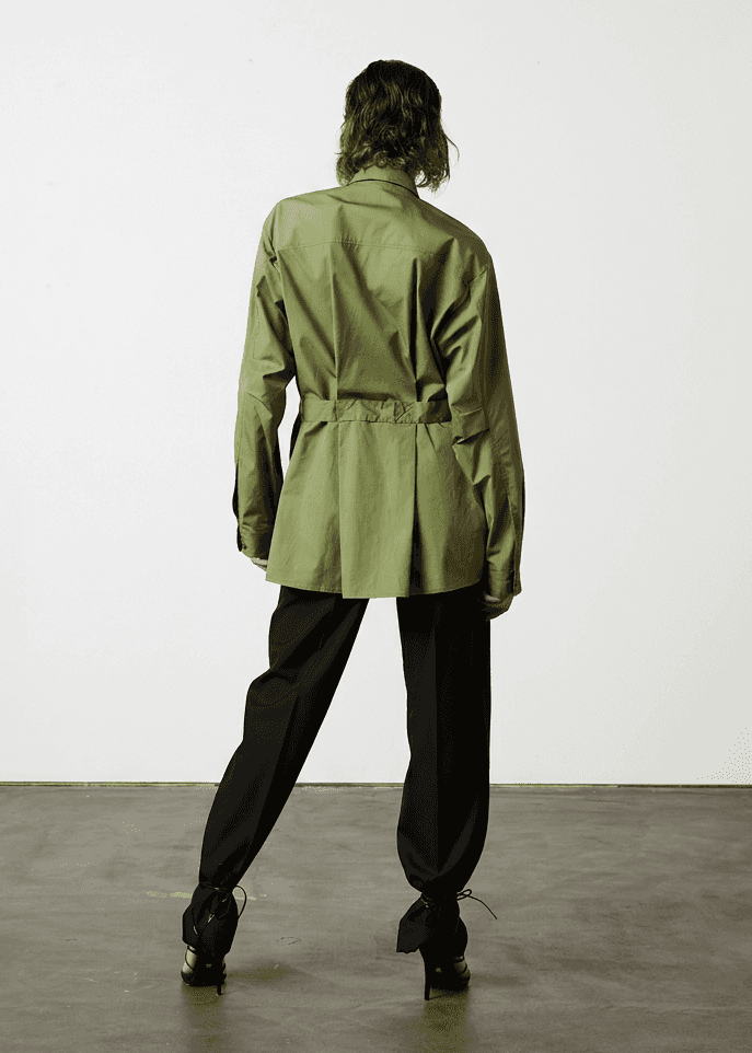 INTERNATIONAL CITIZEN.  Style: Artist Shirt Dress. Style has  back belt ties that adjust at the front with silver rings. The shirt are made of Italian organic Cotton Twill in Nephrite Jade. Spiritually Infused, Sustainable Luxury Fashion in Berlin.