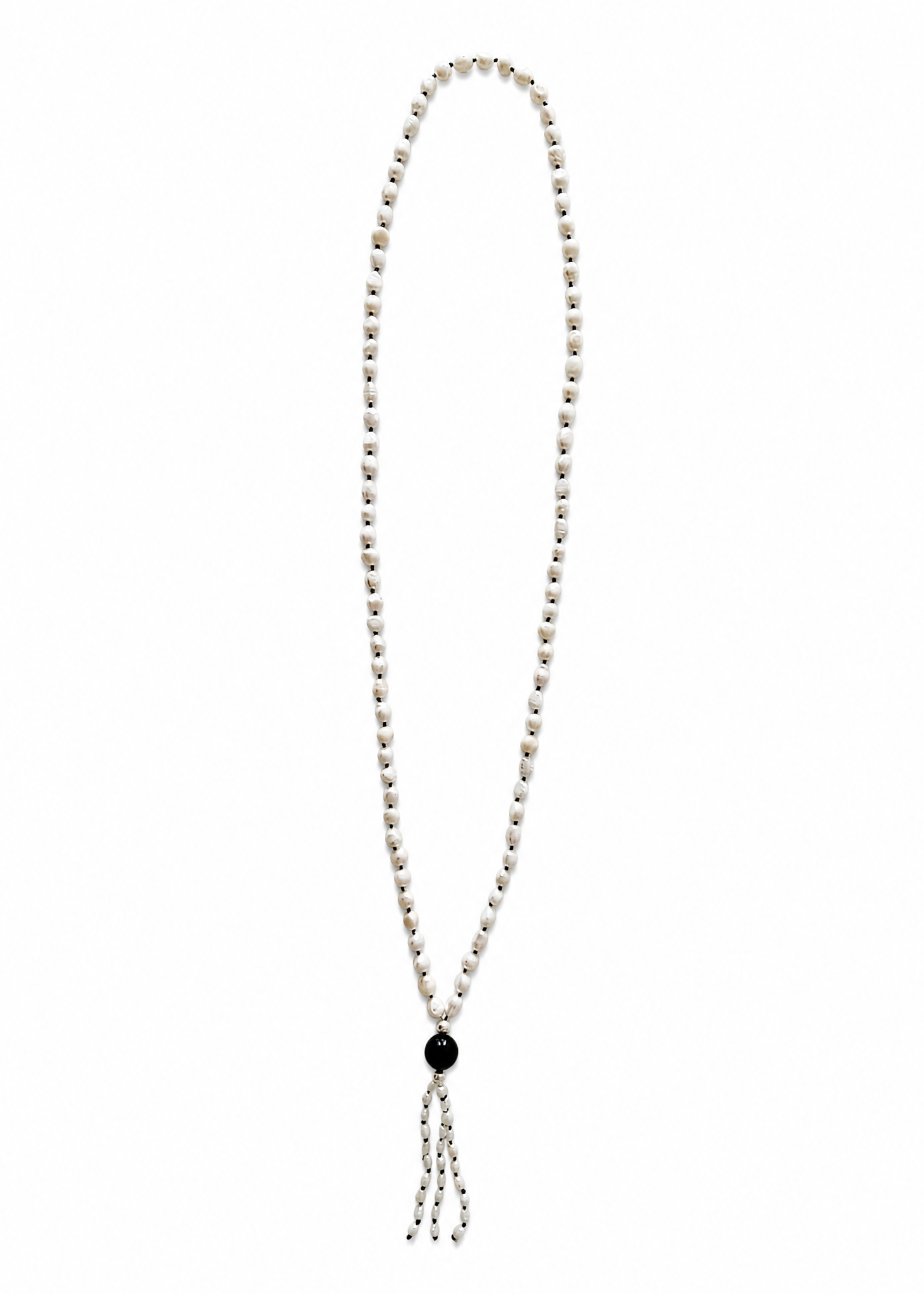 The Leuce Necklace energetically connects to the Crown Chakra. Made of genuine river pearls and obsidian center bead.