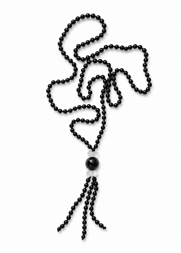 The Despoina Necklace energetically connects to the Root Chakra. This long chain necklace features a tassel pendant. Made of genuine Obsidian & Clear Quartz