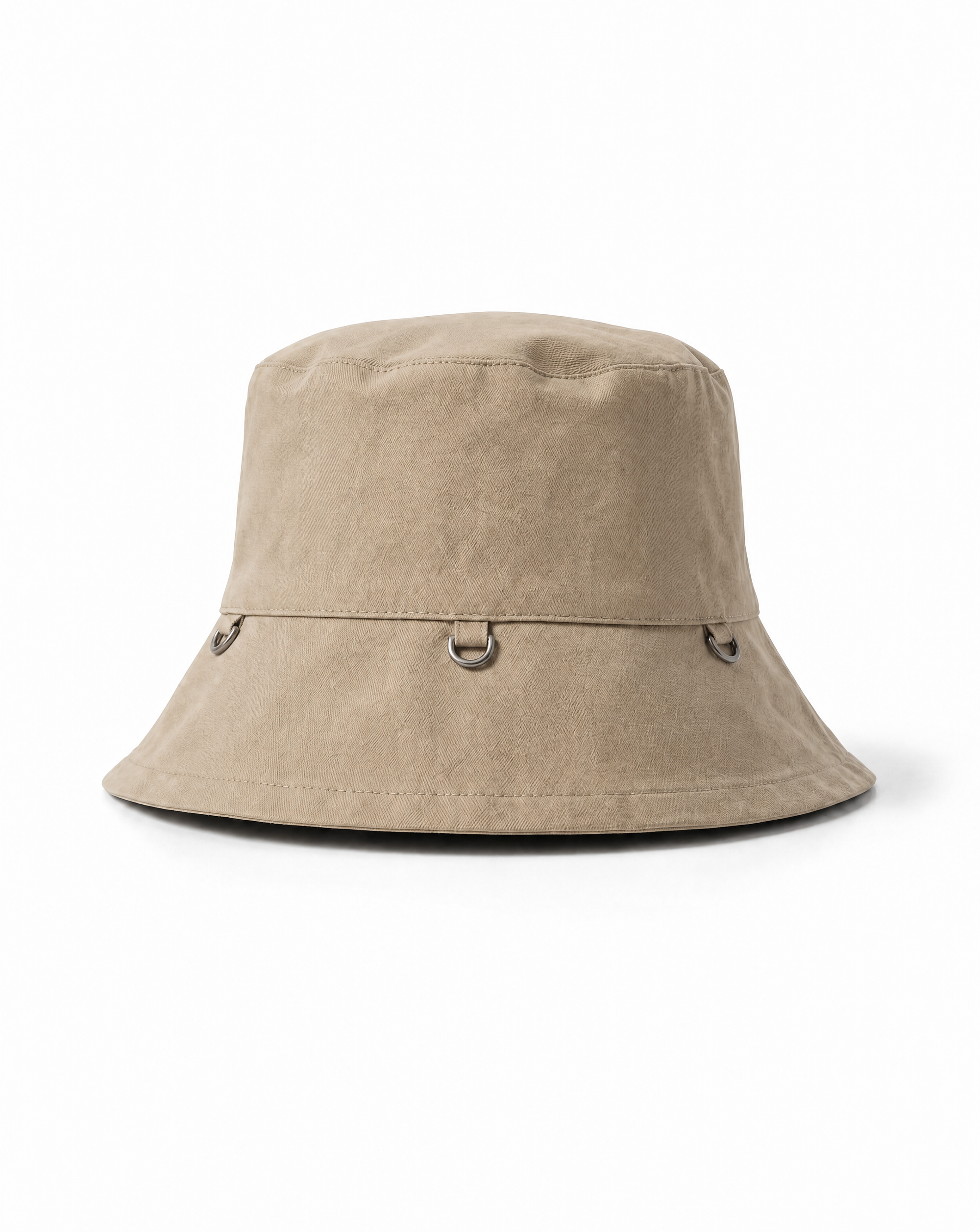 INTERNATIONAL CITIZEN.  Style: The Charm Bucket Hat. Front view. A unisex hat with utility details that feature our signature silver ring at the back and mini rings around the rim to clip your charms.  Made of Italian Organic Cotton Twill, Dune. Spiritually Infused, Sustainable Luxury Fashion in Berlin.