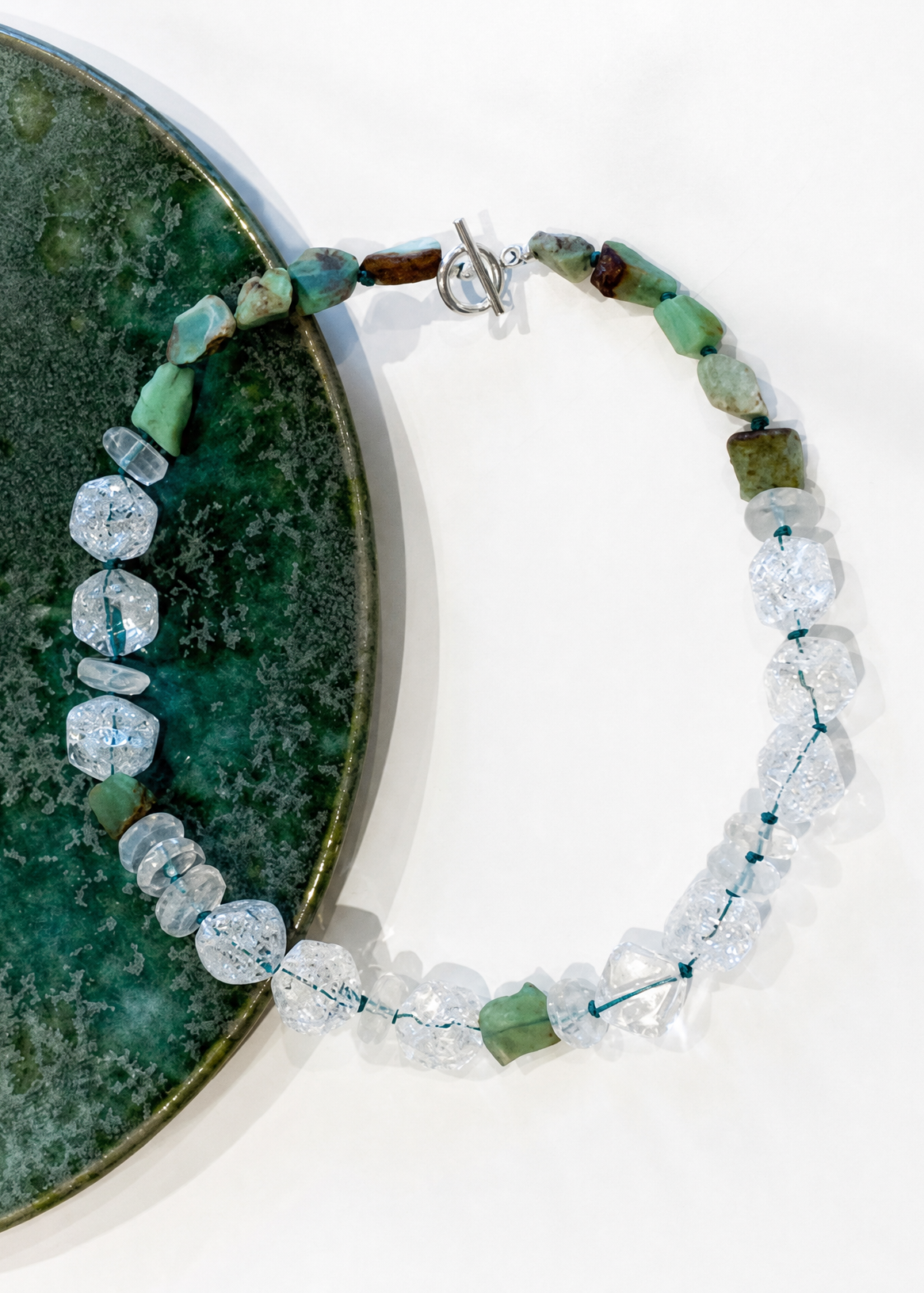 The Milna Necklace energetically connects to the Heart &amp; Crown Chakra, due to the Chyroprase &amp; Clear Quartz crystals.