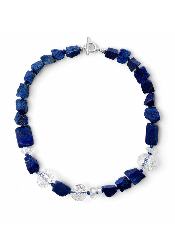 The Calypso Necklace energetically connects to the Third Eye Chakra. Made of lapis lazuli and clear quartz.