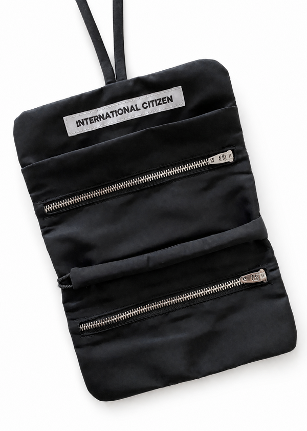 The Jewel Travel Bag is made of water repellent reNylon Gabardine. It features a zipper welt pocket to store you jewelry that folds and ties for closure.
Unisex Item.