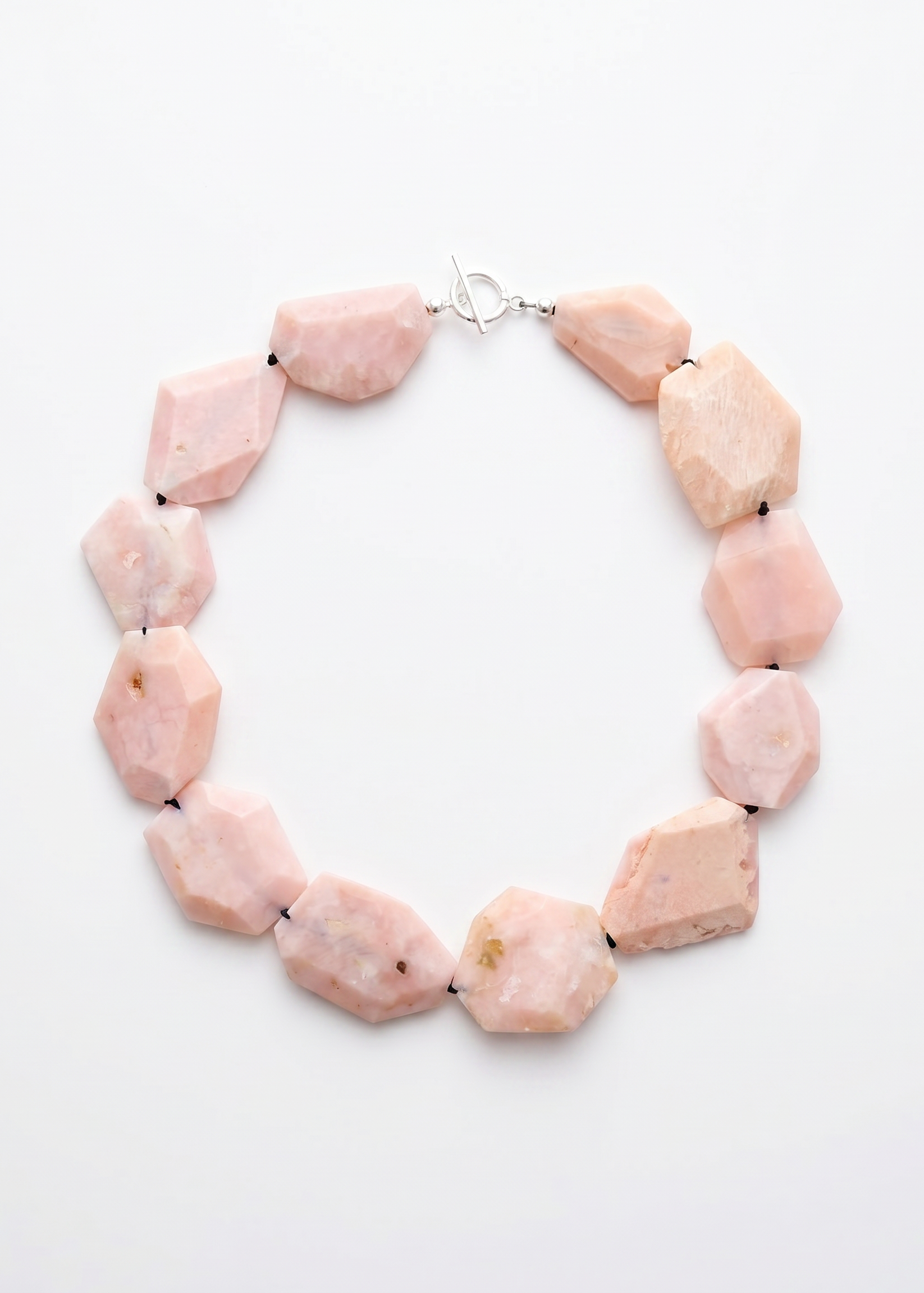 Raw pink opal necklace of unique stones.
