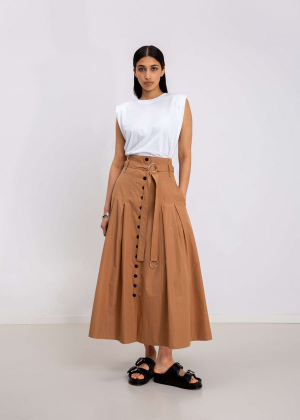 Button Skirt in Tigers Eye, made of organic cotton with buttons up the front closure and belted. Front view