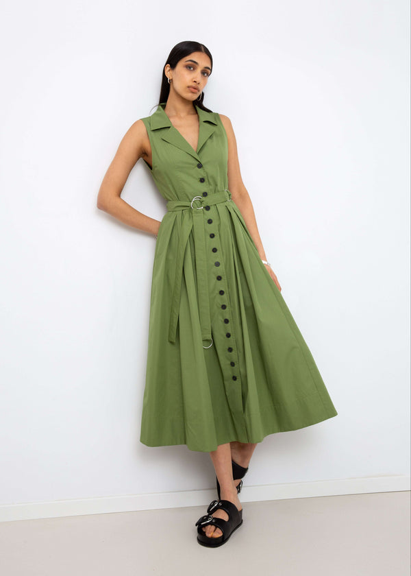 INTERNATIONAL CITIZEN.  Style: Button Dress. A Button Dress with princess seams that open to box pleats below the hips. Detachable belt with silver ring details for closure. The dress is made of Italian organic Cotton in Nephrite Jade. Spiritually Infused, Sustainable Luxury Fashion in Berlin.