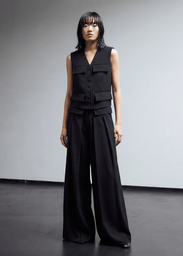 INTERNATIONAL CITIZEN.  Style: The Tarot Vest is a classic vest. Full frontal view. Made of Italian Wool RWS, Obsidian Black. Spiritually Infused, Sustainable Luxury Fashion in Berlin.