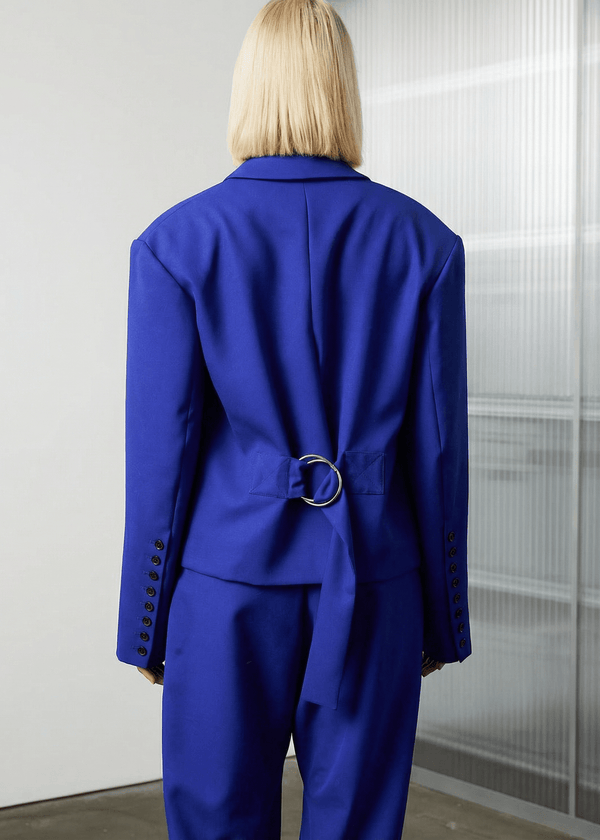 INTERNATIONAL CITIZEN.  Style: The Oversized Men’s Jacket features classic mens tailoring details with an oversized shape. Back body view. Unisex item. Made of Italian Wool RWS, Lapis Lazuli Blue. Spiritually Infused, Sustainable Luxury Fashion in Berlin.