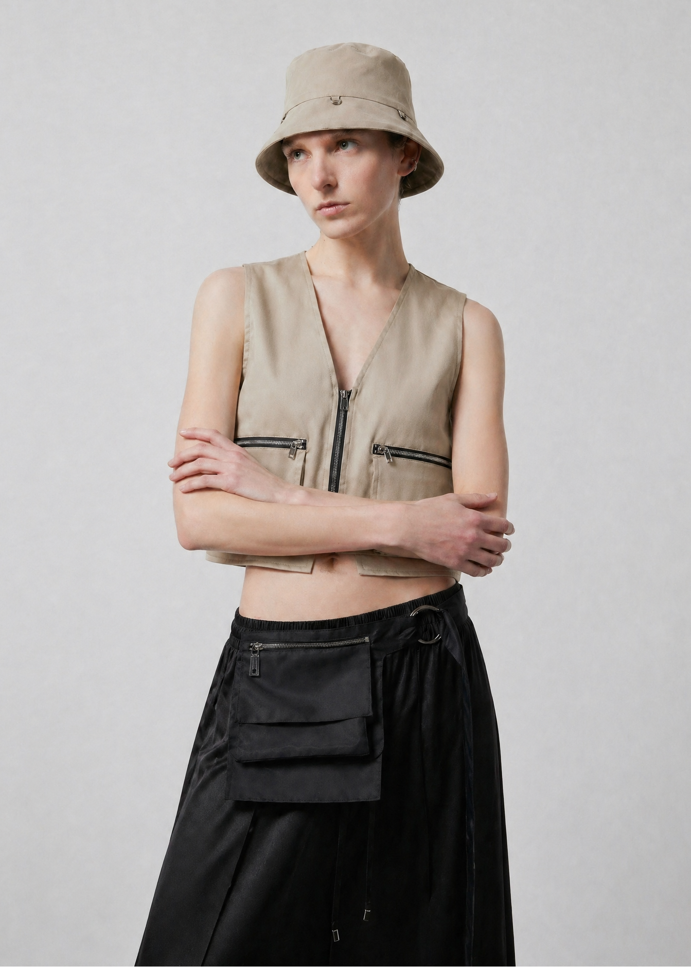 INTERNATIONAL CITIZEN.  Style: The Charm Bucket Hat. Front view. A unisex hat. Made of Italian Organic Cotton Twill, Dune. Spiritually Infused, Sustainable Luxury Fashion in Berlin.