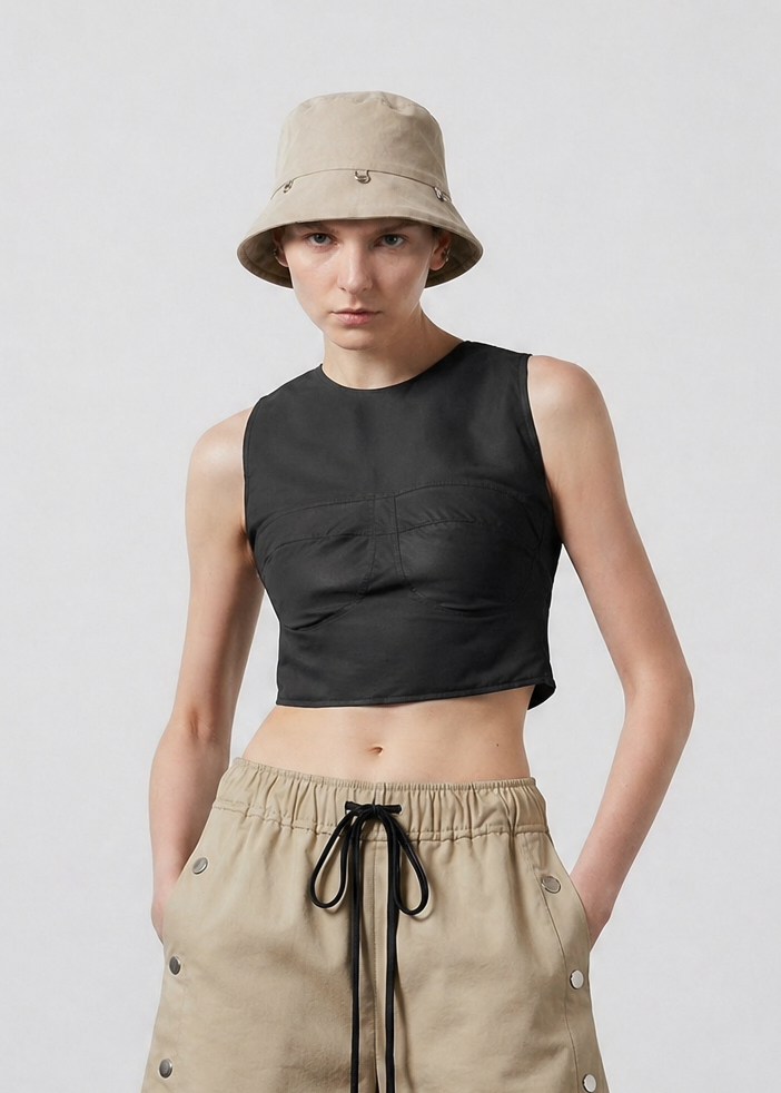 INTERNATIONAL CITIZEN.  Style: The Charm Bucket Hat. Front view. Made of Italian Organic Cotton Twill, Dune. Spiritually Infused, Sustainable Luxury Fashion in Berlin.